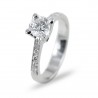 Bague solitaire avec diamant 0.65 et diamants sur la tige 00238